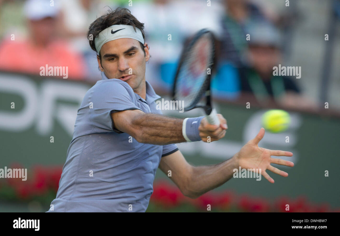 Indiana Wells, USA. 8th Mar, 2014. Roger Federer of Switzerland hits a return to Paul-Henri Mathieu of France during the BNP Paribas Open at Indian Wells Tennis Garden in Indian Wells, the United States, on March 8, 2014. Federer won 2-0. © Yang Lei/Xinhua/Alamy Live News Stock Photo