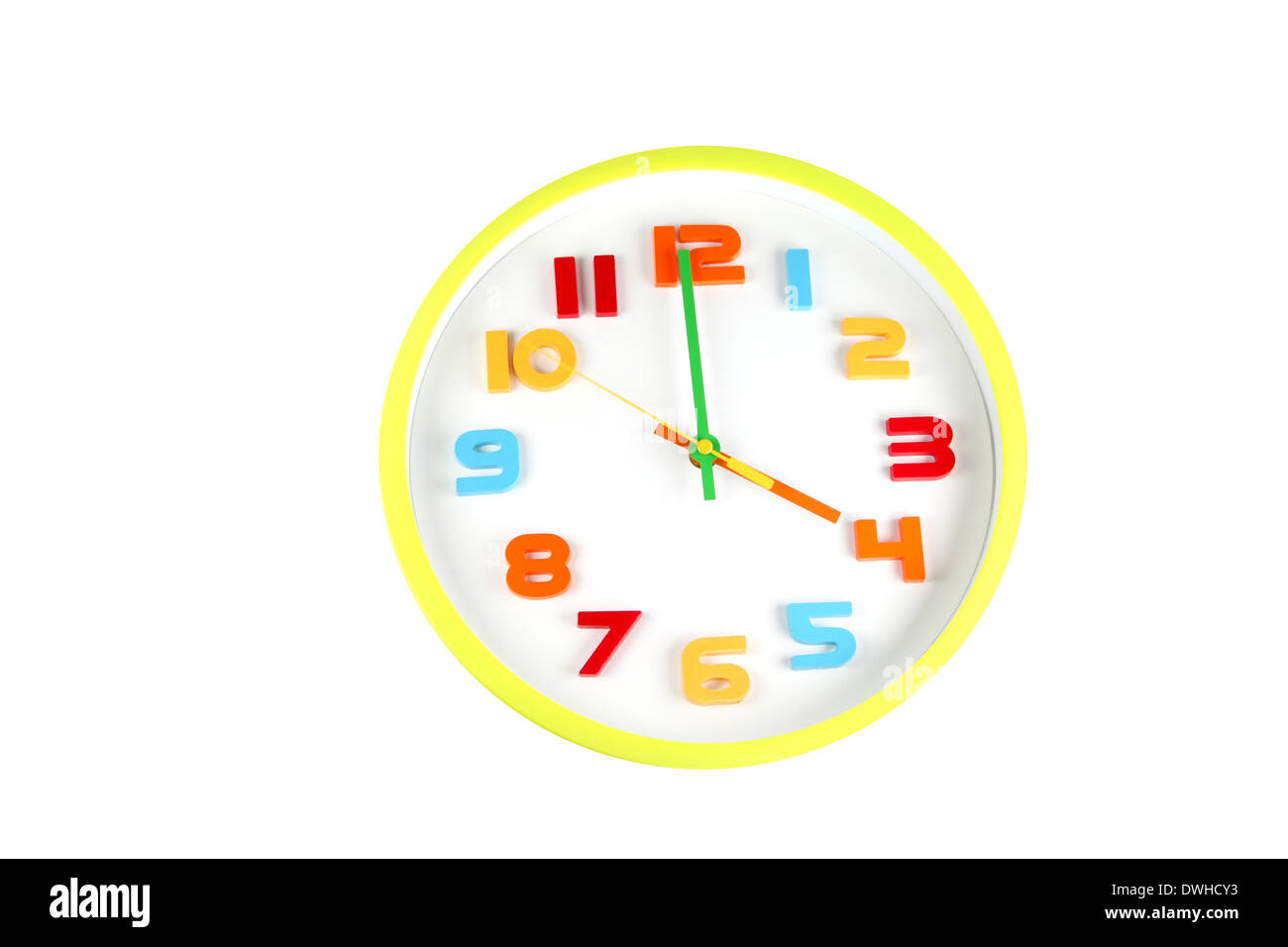 Colorful clock in telling time of four o'clock on white background. Stock Photo
