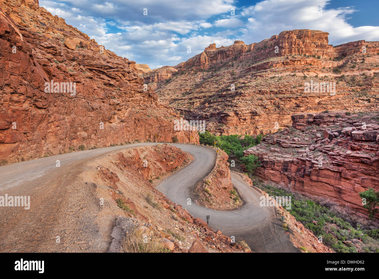 windy road in Canyonlands near Moab, Utah, descending into a canyon Stock Photo