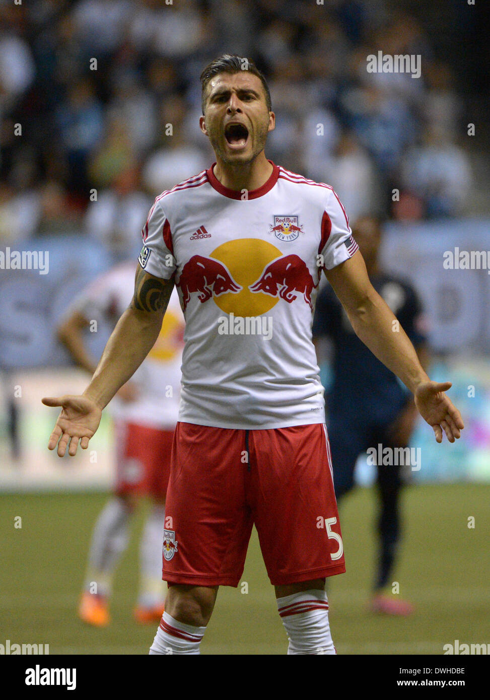 Vancouver, Canada. 8th Mar, 2014. New York Red Bulls' Armando reacts to loosing a MLS soccer season opener to Vancouver Whitecaps at BC Place in Vancouver, Canada, on March 8, 2014. Whitecaps defeated Red Bulls 4-1. Credit:  Sergei Bachlakov/Xinhua/Alamy Live News Stock Photo