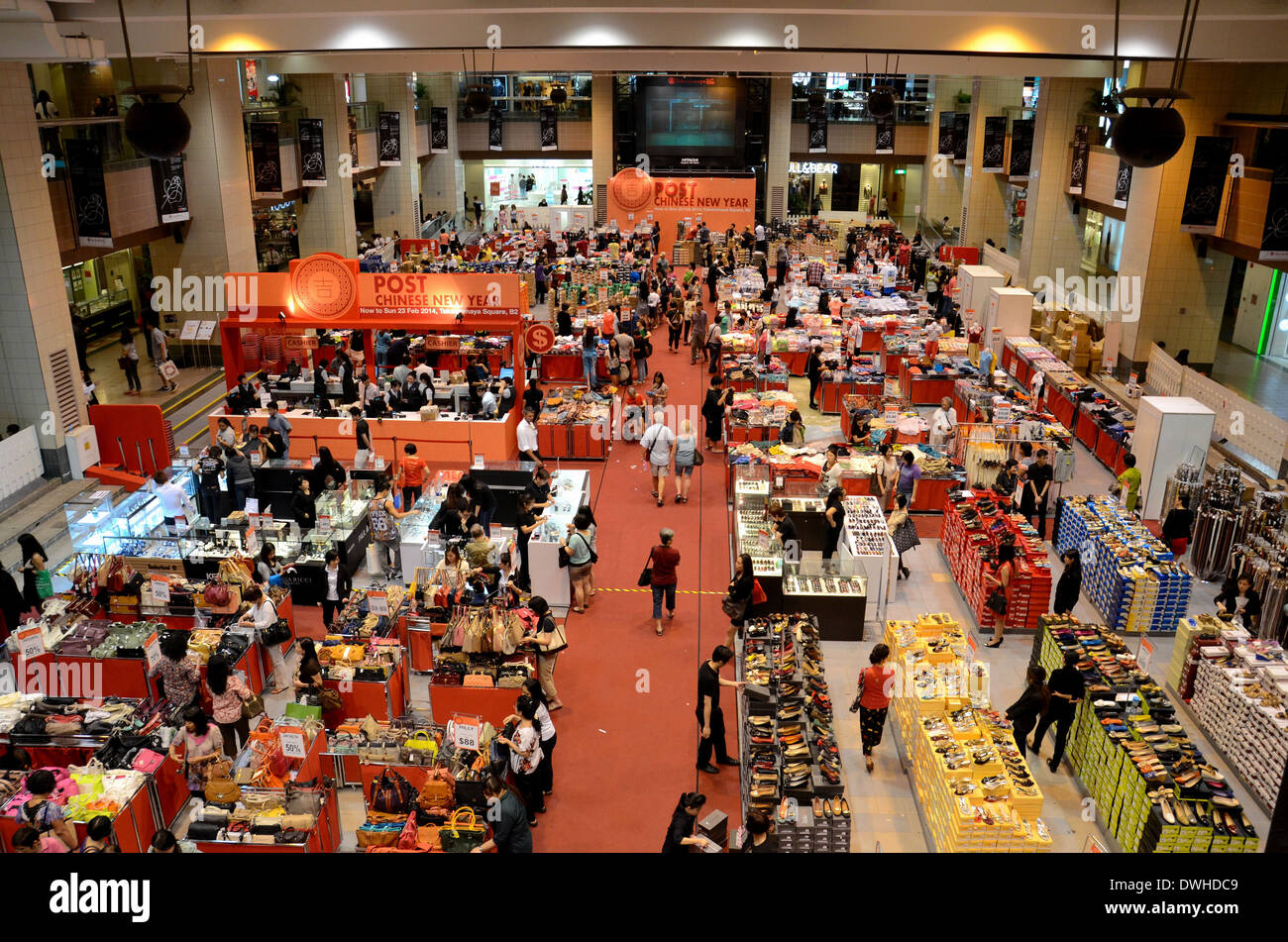 Shoppers throng post Chinese New Year bazaar in Takashimaya basement Orchard Road Singapore Stock Photo