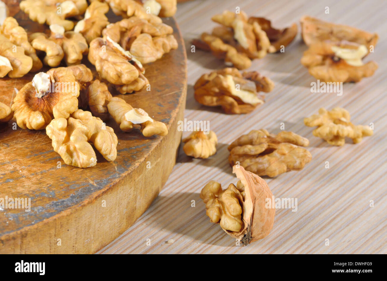 Dried walnuts on wooden table Stock Photo
