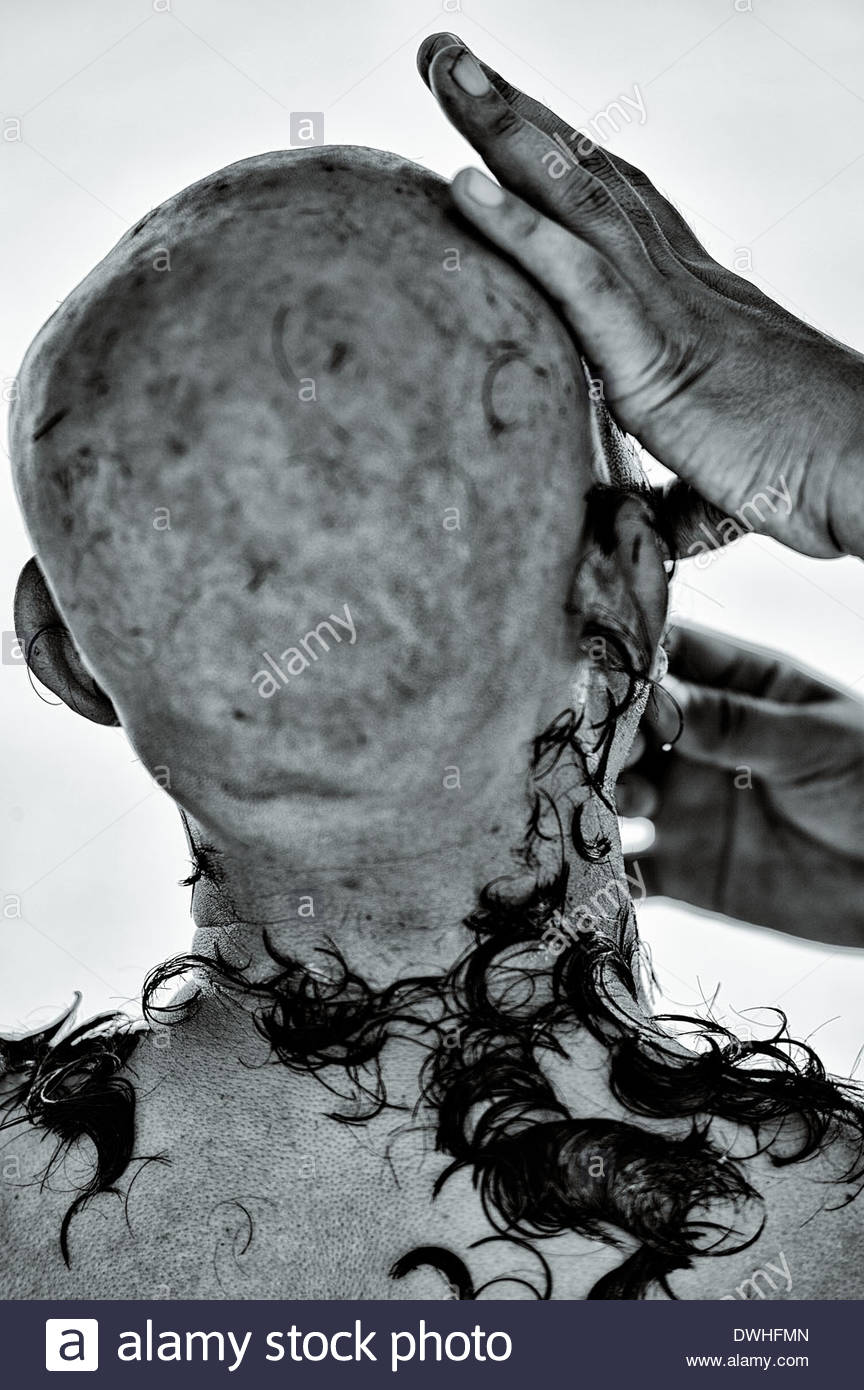 Buddhist Monk Shaving Head High Resolution Stock Photography and Images