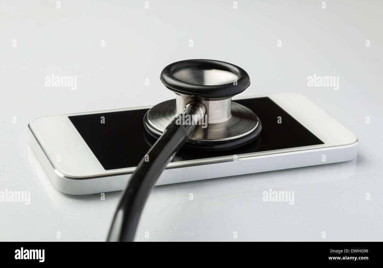 Smartphone with a stethoscope indicating cell phone repair Stock Photo Alamy