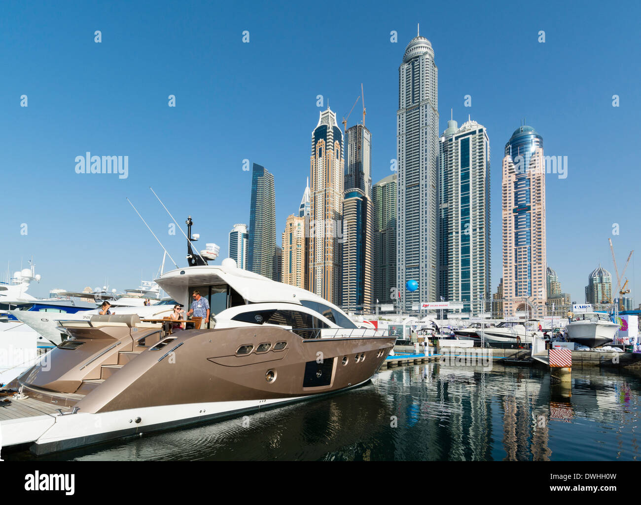 Yachts and skyline of skyscrapers at Dubai International Boat Show 2014 United Arab Emirates Stock Photo