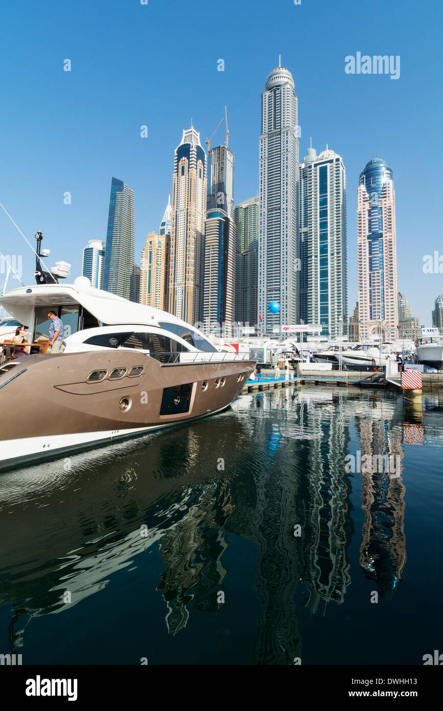 Yachts and skyline of skyscrapers at Dubai International Boat Show 2014 United Arab Emirates Stock Photo