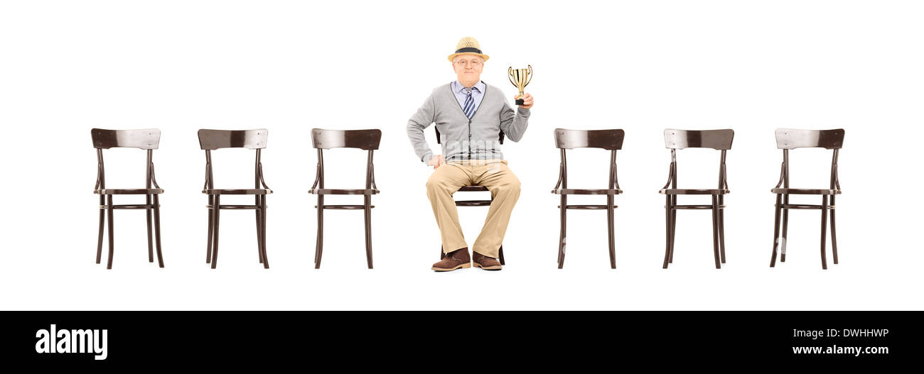 Seated old man holding hi-res stock photography and images - Alamy