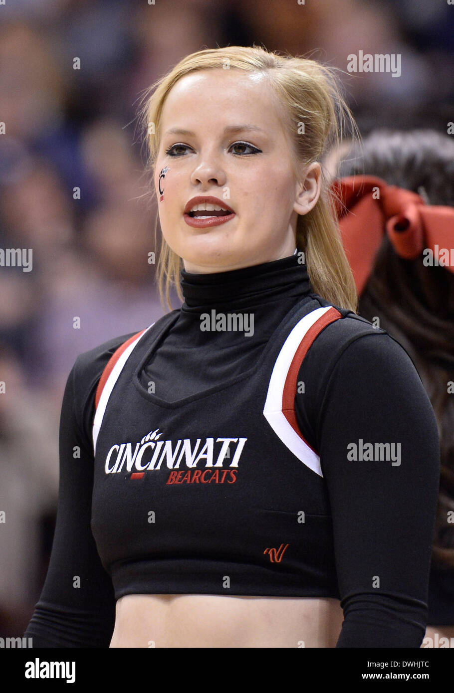 Uncasville, CT, USA. 8th Mar, 2014. Saturday March 8, 2014: A Cincinnati Bearcat cheerleader looks on during the 2nd half of the American Athletic Conference womens basketball tournament game between Cincinnati and UConn at Mohegan Sun Arena in Uncasville, CT. UConn beat Cincinnati easily 72-42. Bill Shettle / Cal Sport Media. © csm/Alamy Live News Stock Photo