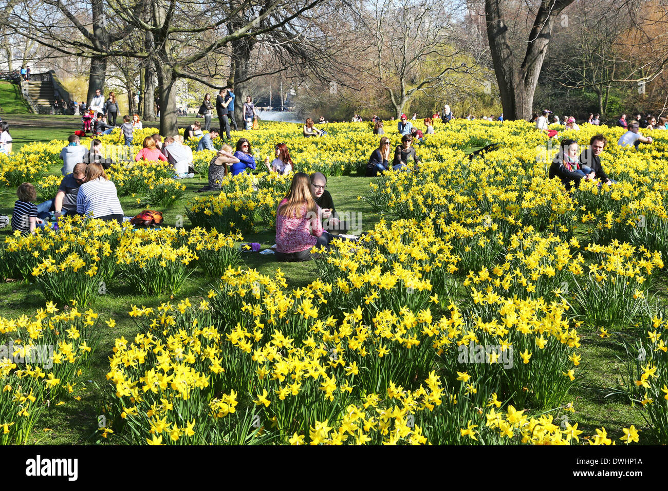 London, UK. 9th March 2014. People enjoying the warm weather and spring