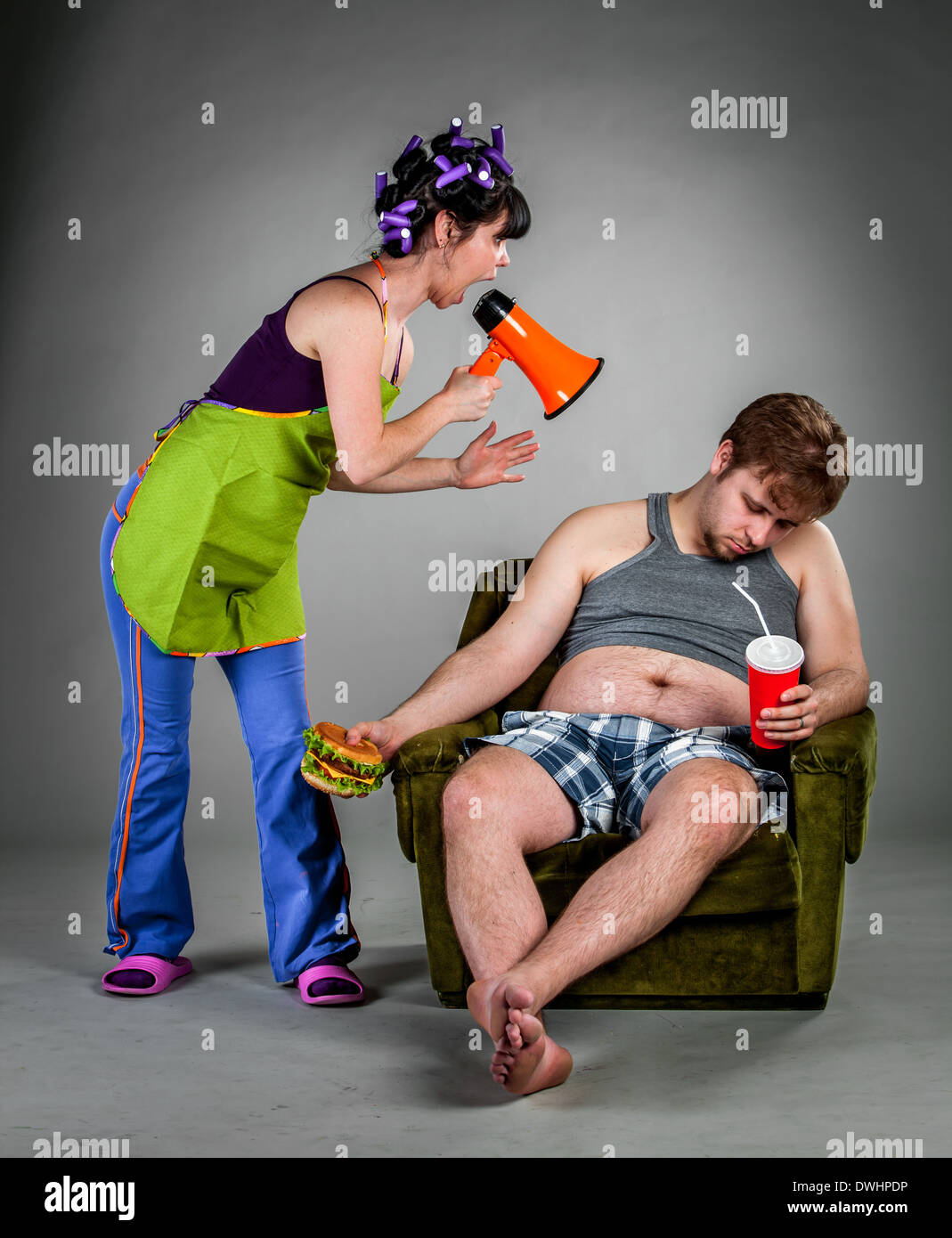 Quarrel of the husband with the wife Stock Photo