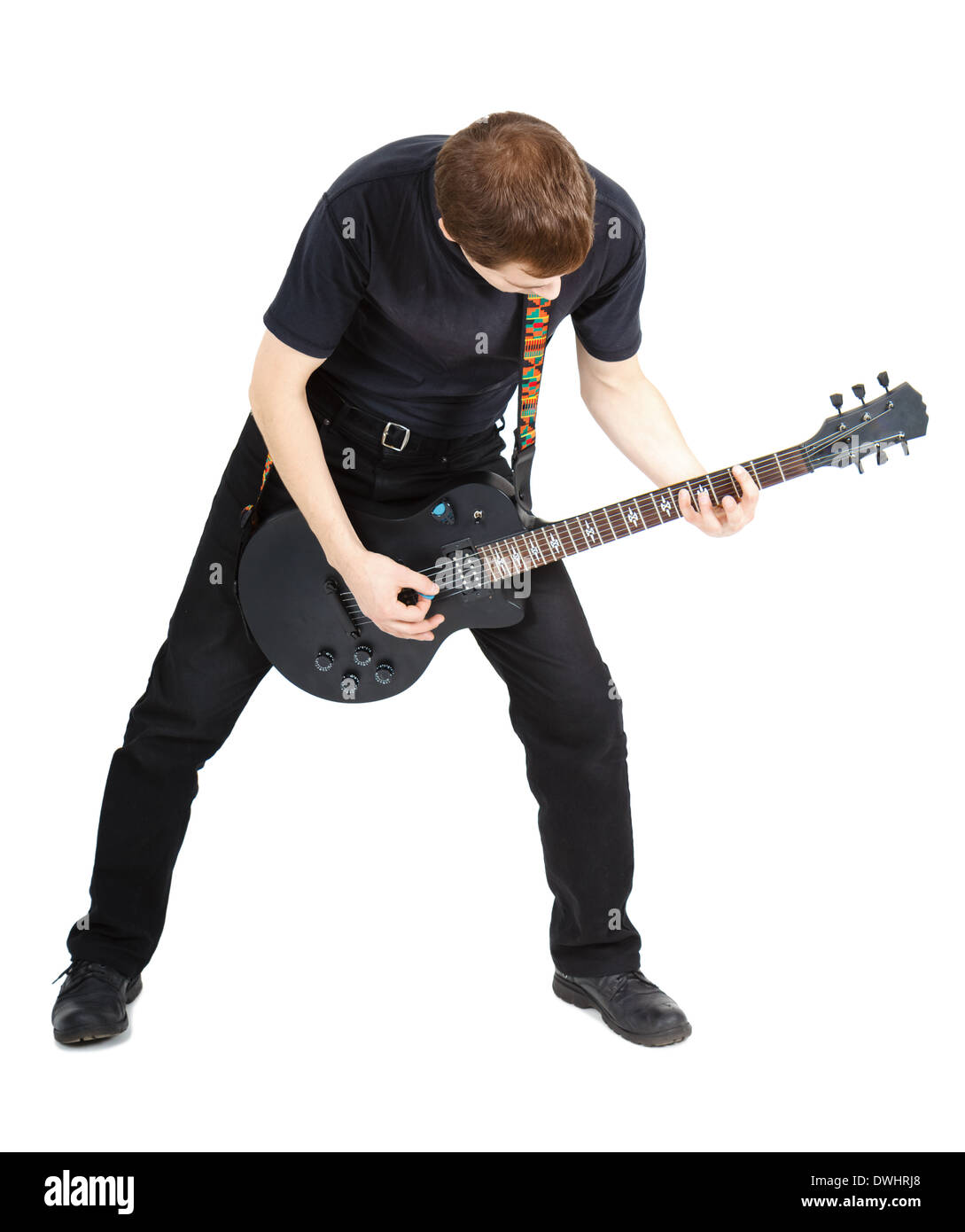 Man in black clothes with an electric guitar Stock Photo