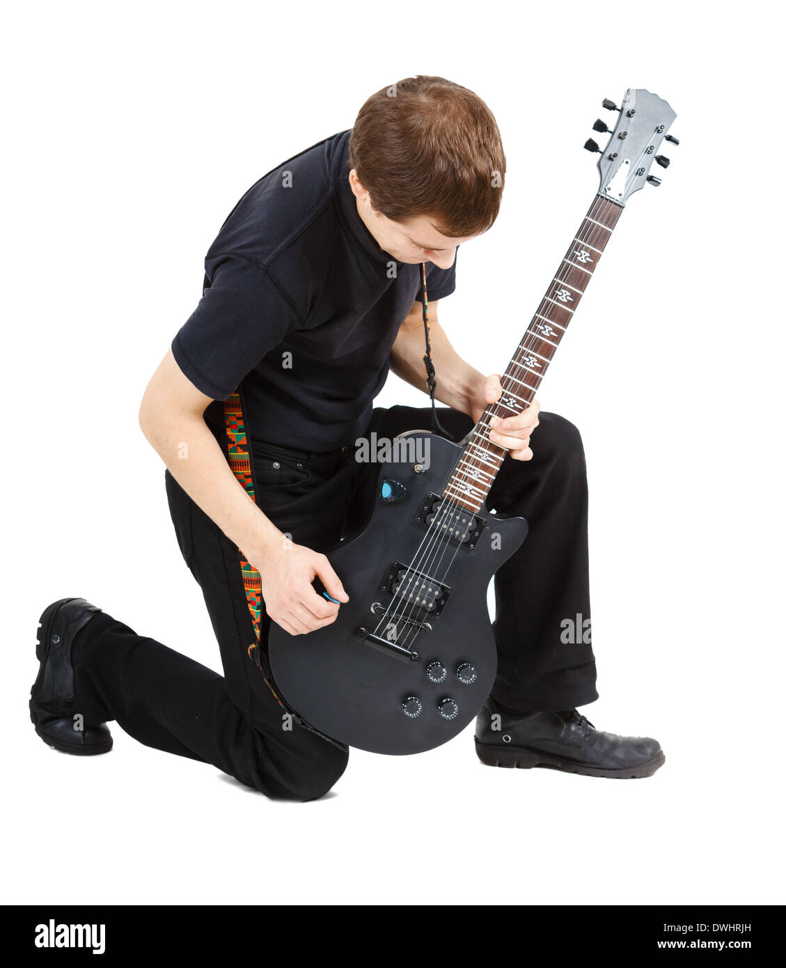 Man in black clothes with an electric guitar Stock Photo