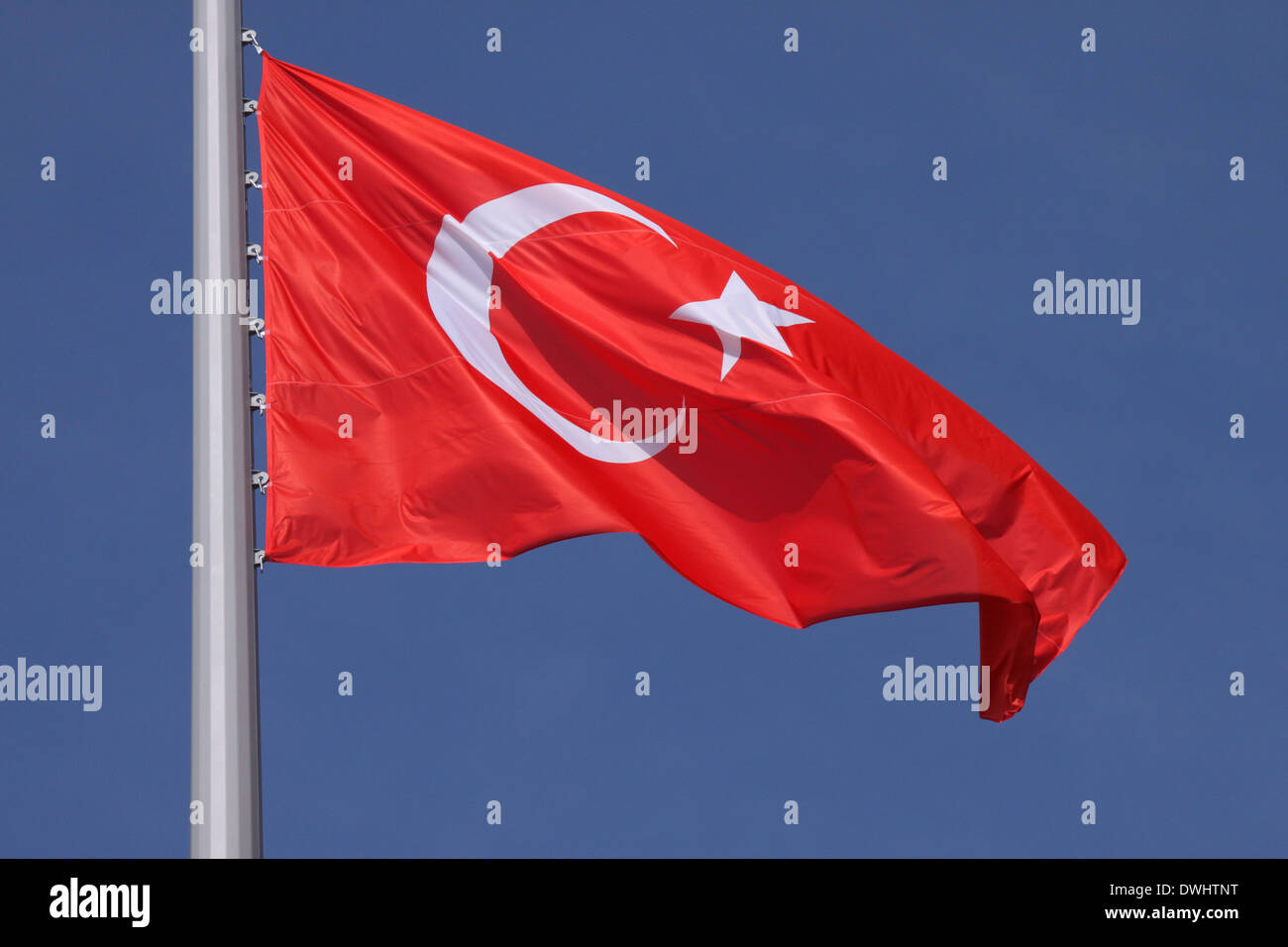 flag of Turkey over blue sky Stock Photo