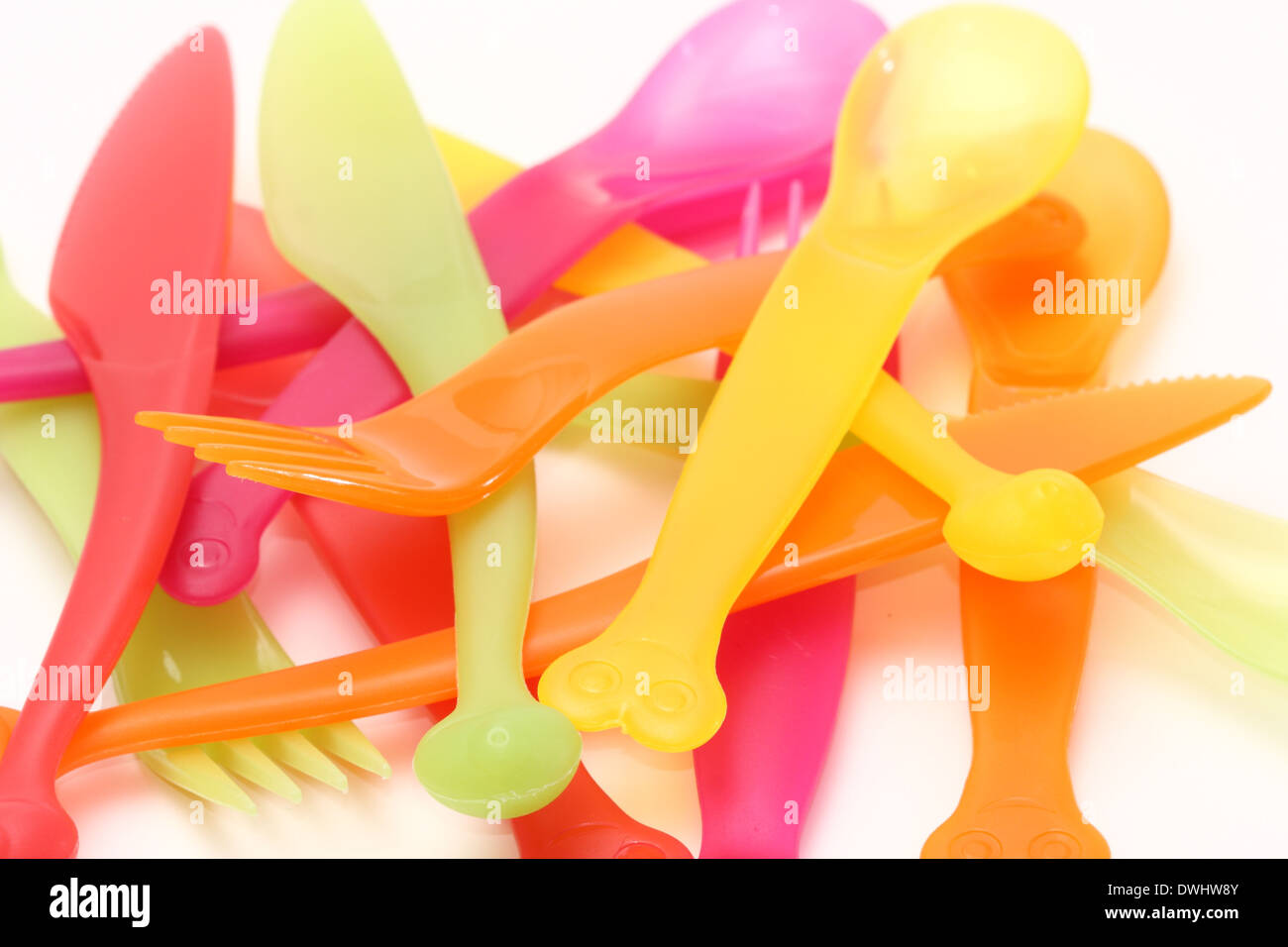 Coloured plastic cutlery Stock Photo