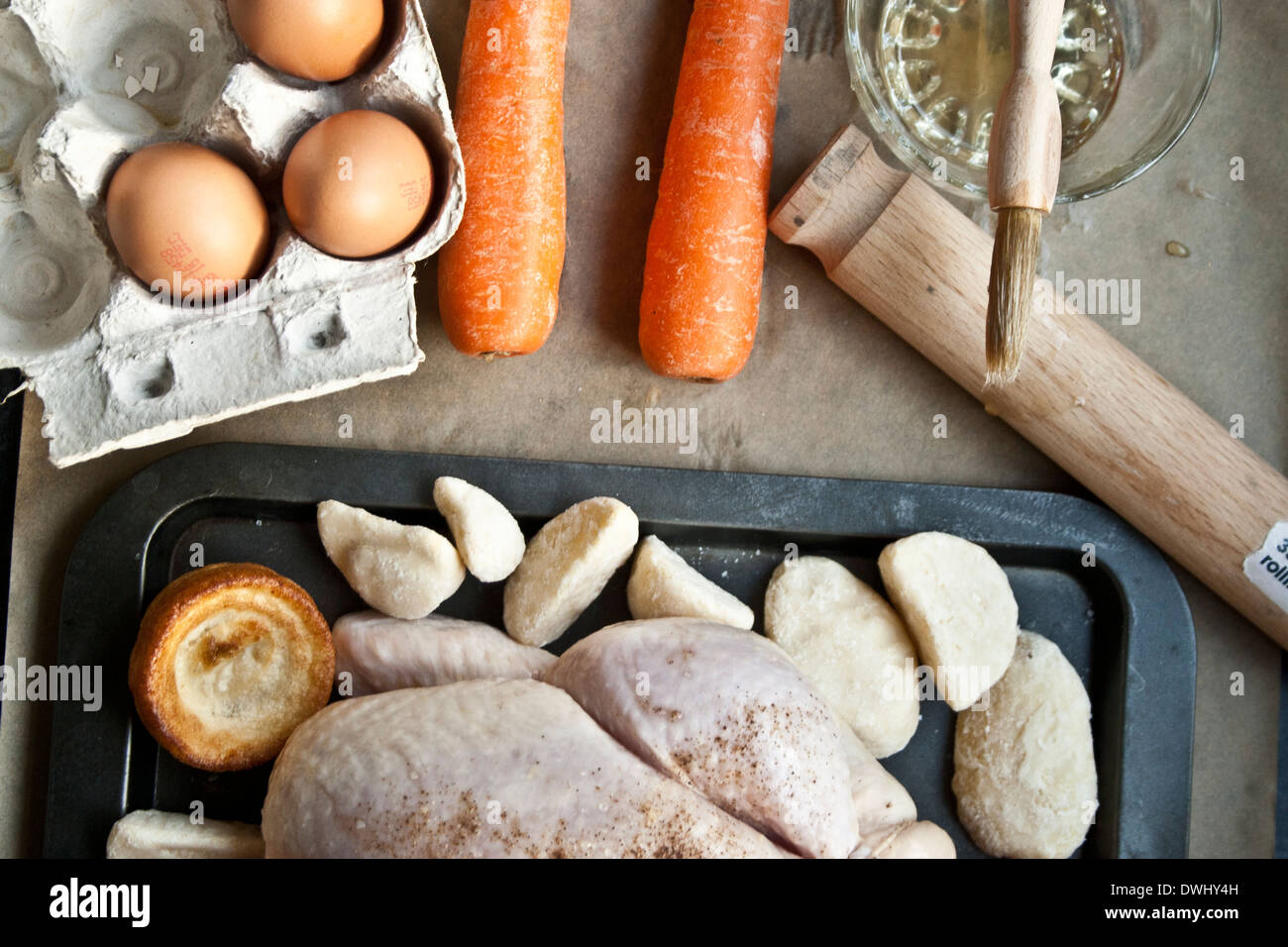 A shot of a chicken and vegetables unprepared. Stock Photo