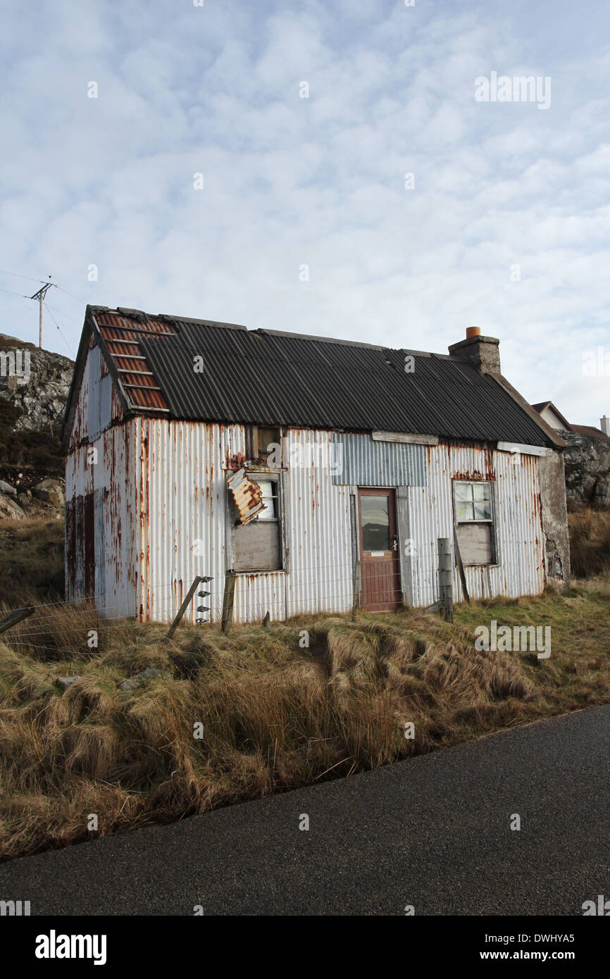 derelict house made of corrugated metal Kinlochbervie Scotland March