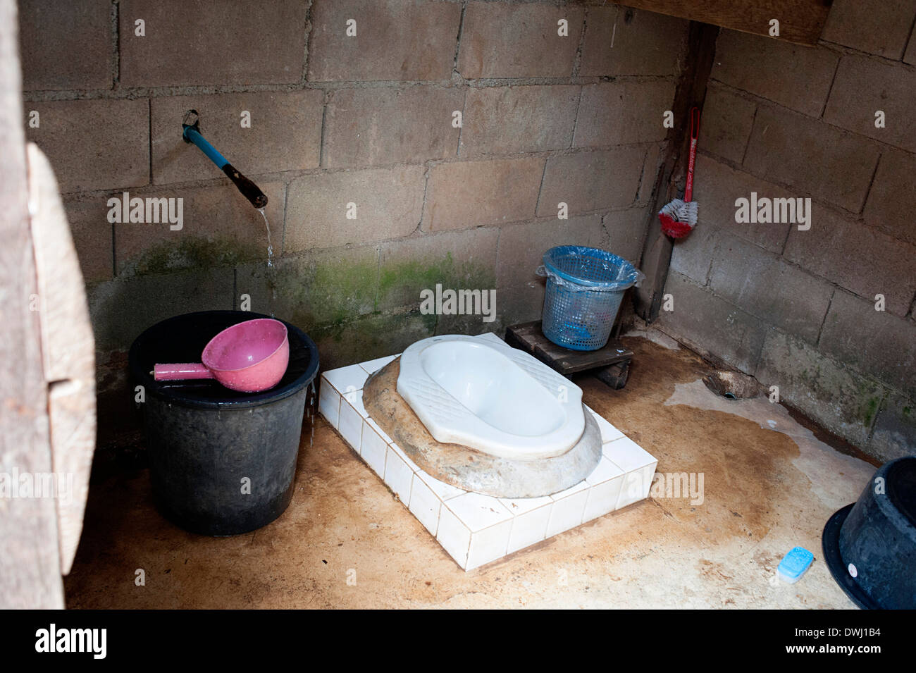 Basic village bathroom Stock Photo Alamy
