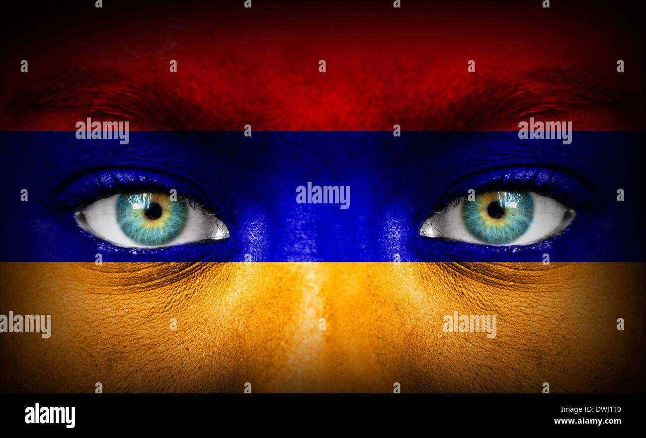 Human face painted with flag of Armenia Stock Photo
