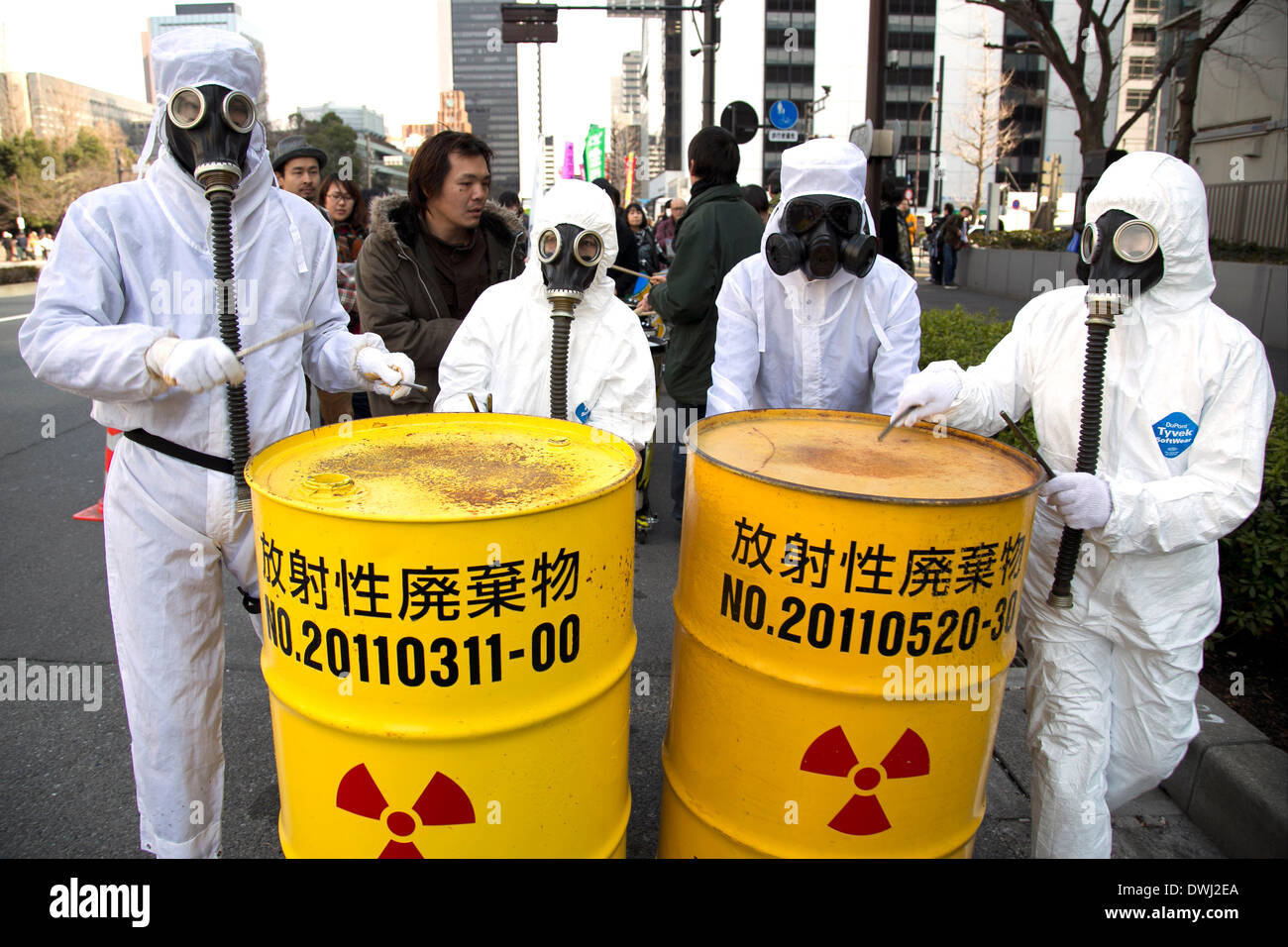 Tokyo, Japan Antinuclear protestors wearing protective suits show