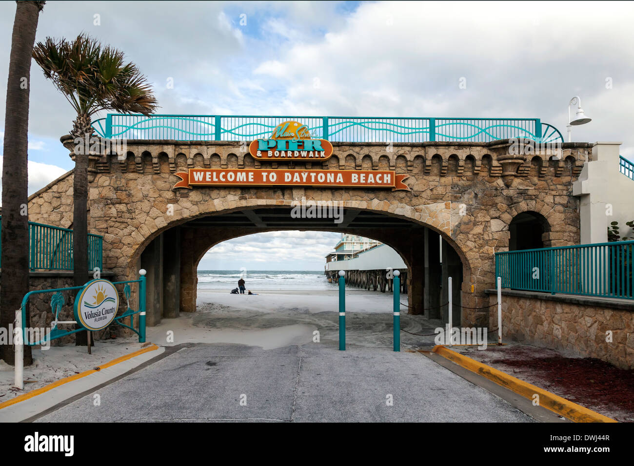 Welcome to Daytona Beach Pier signs and archway portal over the road onto Daytona Beach, Florida, USA. Stock Photo