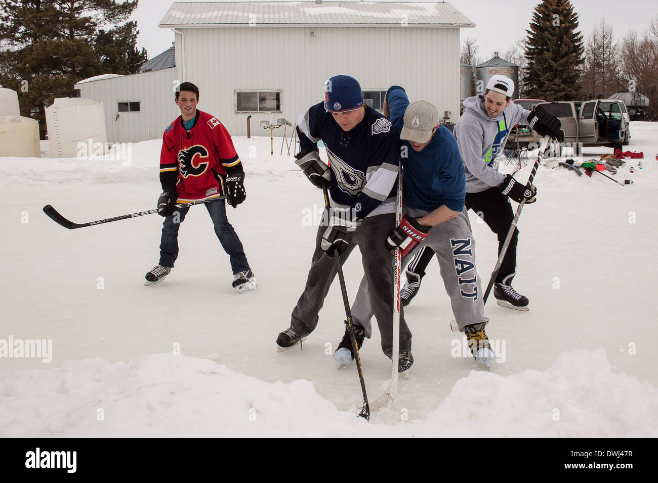 Outdoor Ice Hockey with friends. A friendly recreational game of hockey