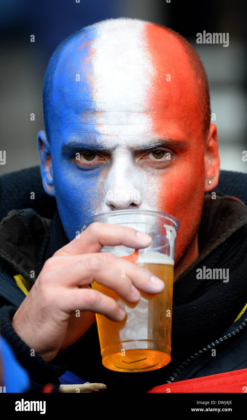 Edinburgh, UK. 9th Mar, 2014. March 8, 2014 - Edinburgh, United Kingdom - A french fan with painted face drinks his pint - RBS 6Nations - Scotland vs France - Murrayfield Stadium - Edinburgh - Scotland - 8th March 2014 - Pic Simon Bellis/Sportimage. © csm/Alamy Live News Stock Photo