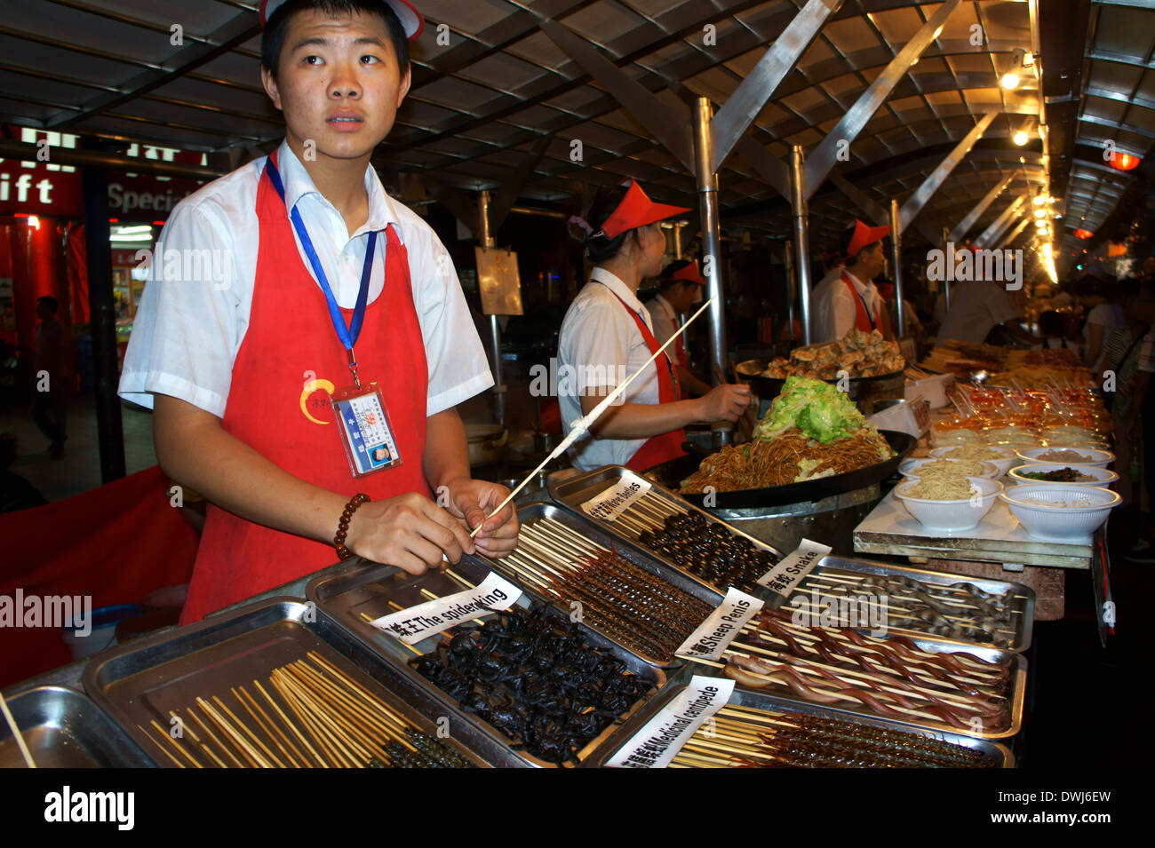 Exotic food booth at the Donghuamen Street market, Beijing, China Stock Photo