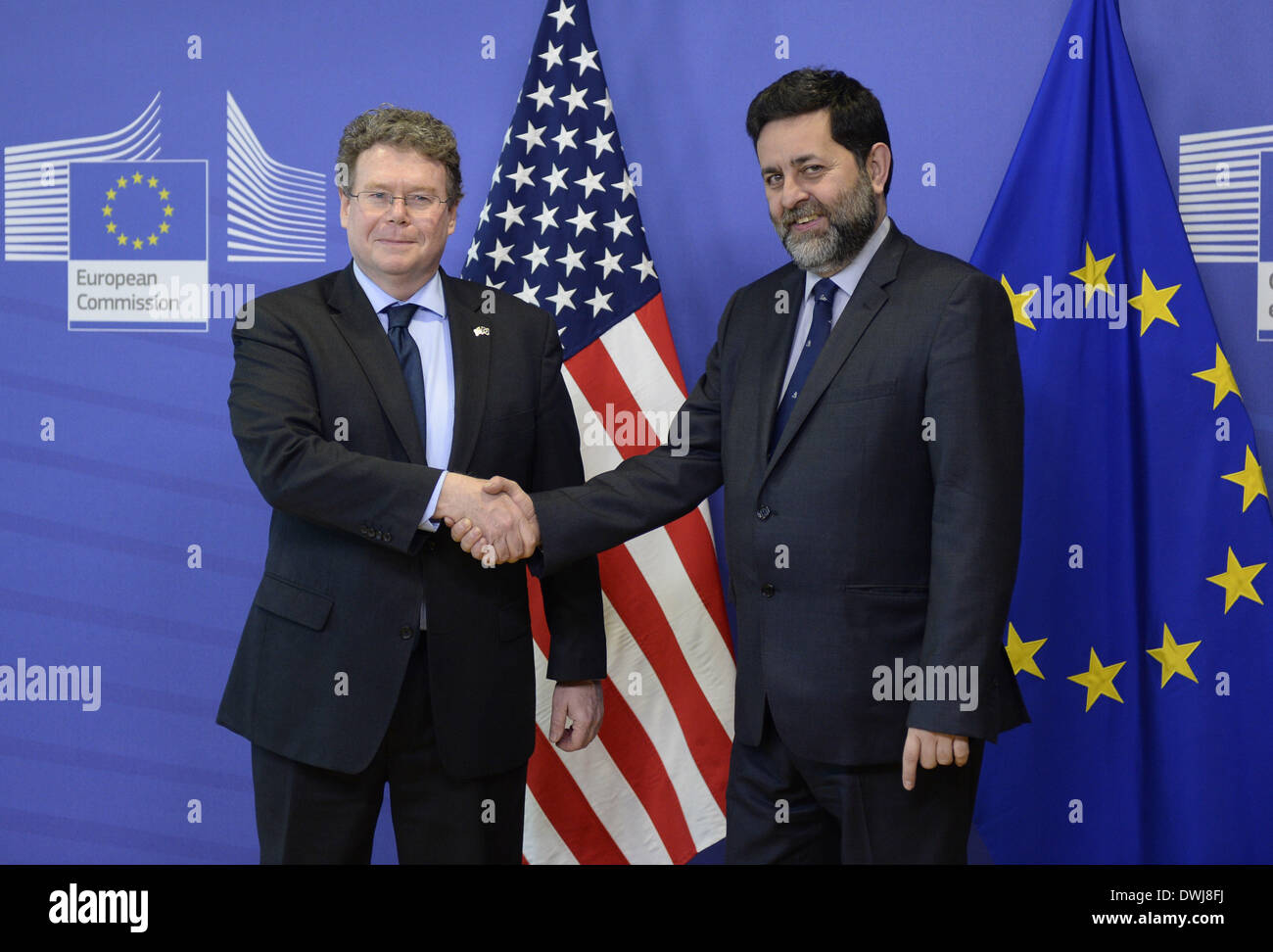 Brussels, Belgium. 10th Mar, 2014. EU chief negotiator Ignacio Garcia Bercero (R) and US chief negotiator Dan Mullaney shake hands prior to the fourth round of negotiations for the Transatlantic Trade and Investment Partnership (TTIP) at the EU Headquarters in Brussels, capital of Belgium, March 10, 2014. Credit:  Ye Pingfan/Xinhua/Alamy Live News Stock Photo