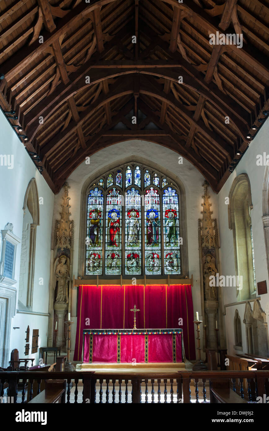 Altar and Stained Glass window interior of St John The Baptist Church