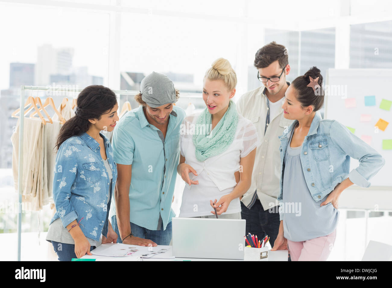 Fashion designers using laptop Stock Photo