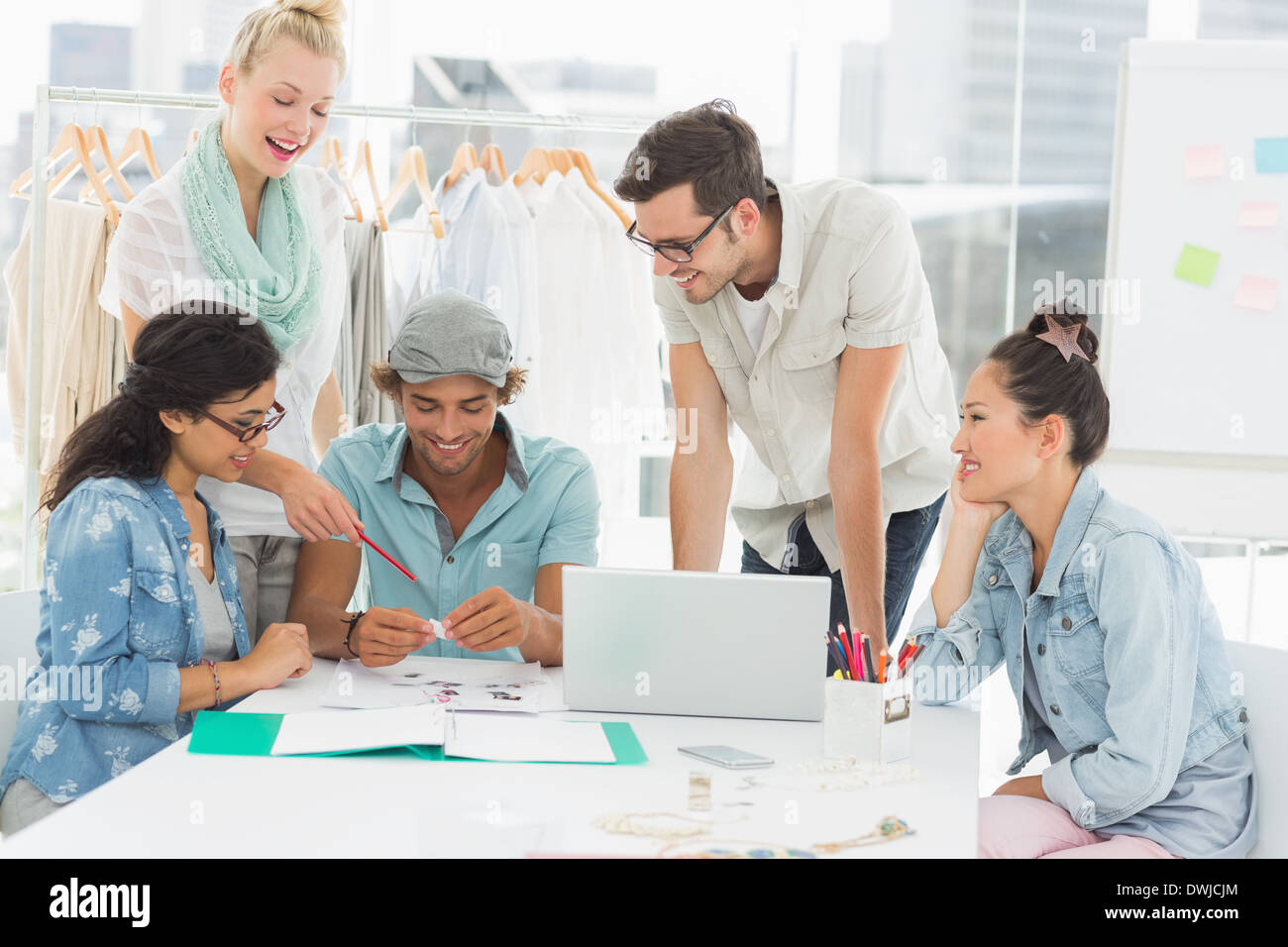 Fashion designers using laptop Stock Photo