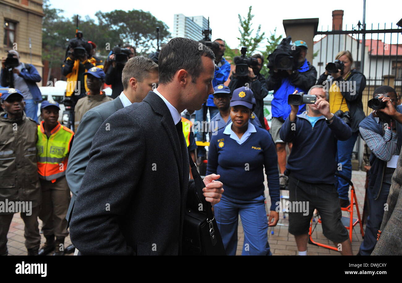Pretoria, South Africa. 10th Mar, 2014. Oscar Pistorius (front) walks to Pretoria's North Gauteng High Court in Pretoria, South Africa, on March 10, 2014, at the start of the second week Oscar Pistorius' murder trial. Credit:  Philly/Xinhua/Alamy Live News Stock Photo