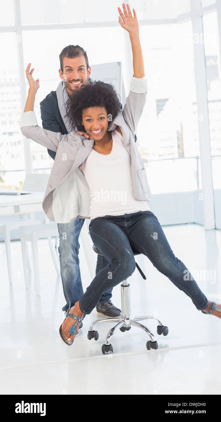 Young woman pushing chair hires stock photography and images Alamy