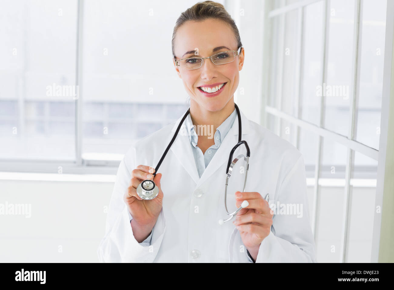 Beautiful female doctor with stethoscope in hospital Stock Photo Alamy