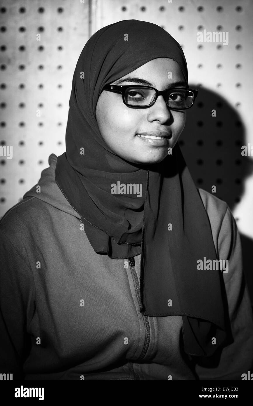 (140310) -- CAIRO, March 10, 2014 (Xinhua) -- This is a portait of Menna, a member of the Children Choir of Talents Development Center, at Cairo Opera House in Cairo, Egypt, Nov. 28, 2013. Dr. Nadia Abdelaziz Awad, a music professor of Helwan University and mentor of some singers of Cairo Opera House, has been operating a children choir for more than 20 years. Despite the convulsions of Egyptian society since 2011, Dr. Nadia Abdelaziz Awad and members of the children choir adhere to hold weekly rehearsal and perform at Cairo Opera House from time to time.' No matter what happen, the art will g Stock Photo