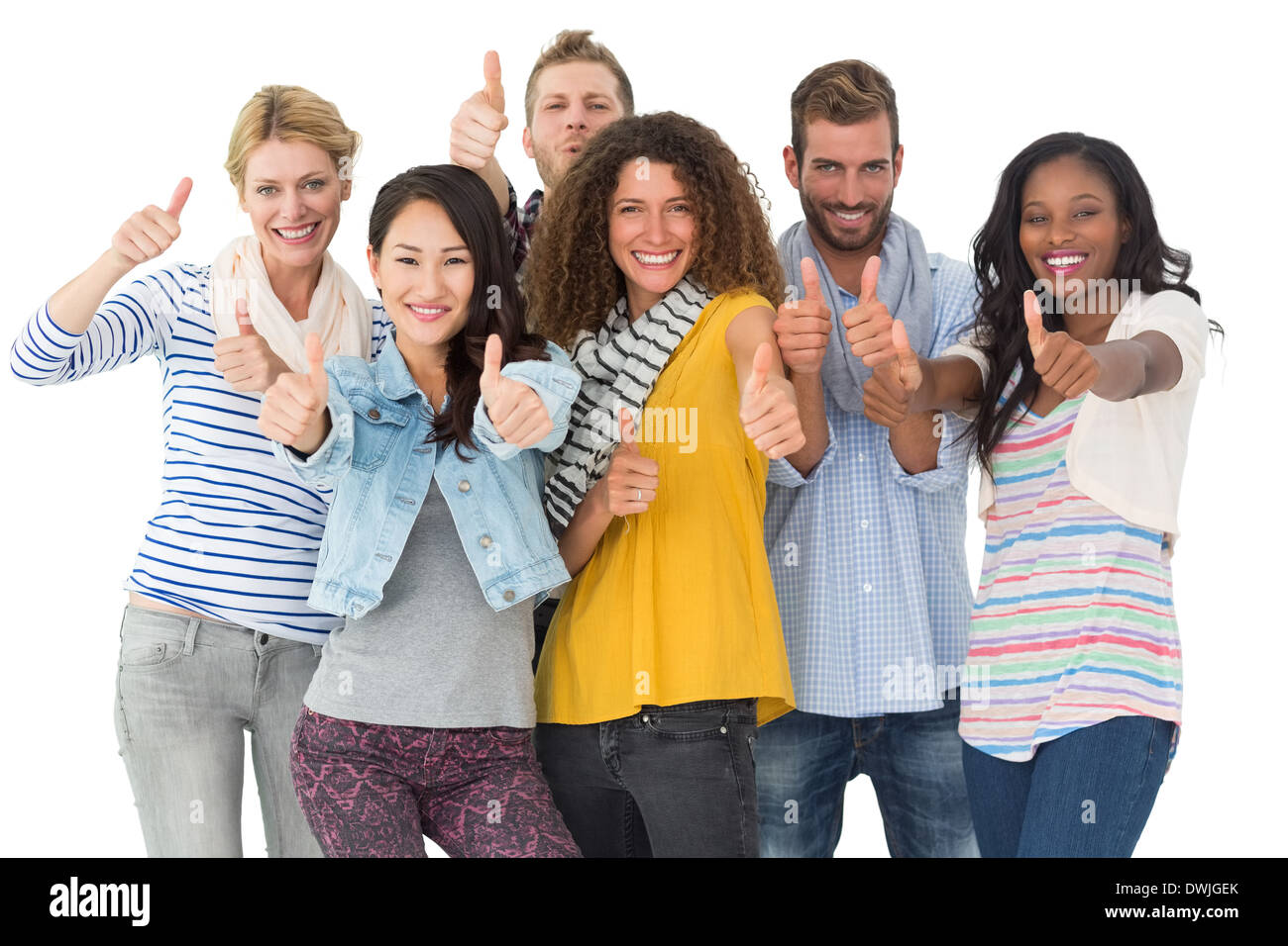 Happy group of young friends giving thumbs up to camera Stock Photo - Alamy