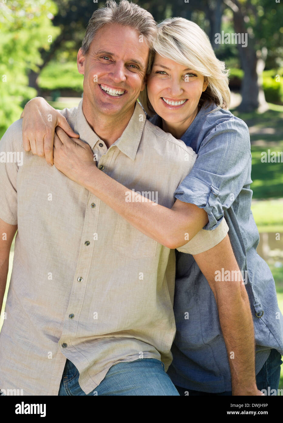 Loving couple spending time together in park Stock Photo