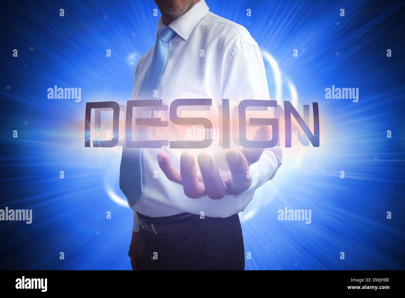 Businessman presenting the word design Stock Photo - Alamy