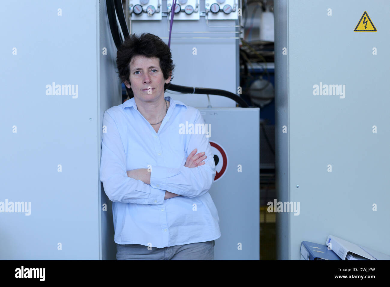 scientist technical person woman middle age working in a technical lab Stock Photo