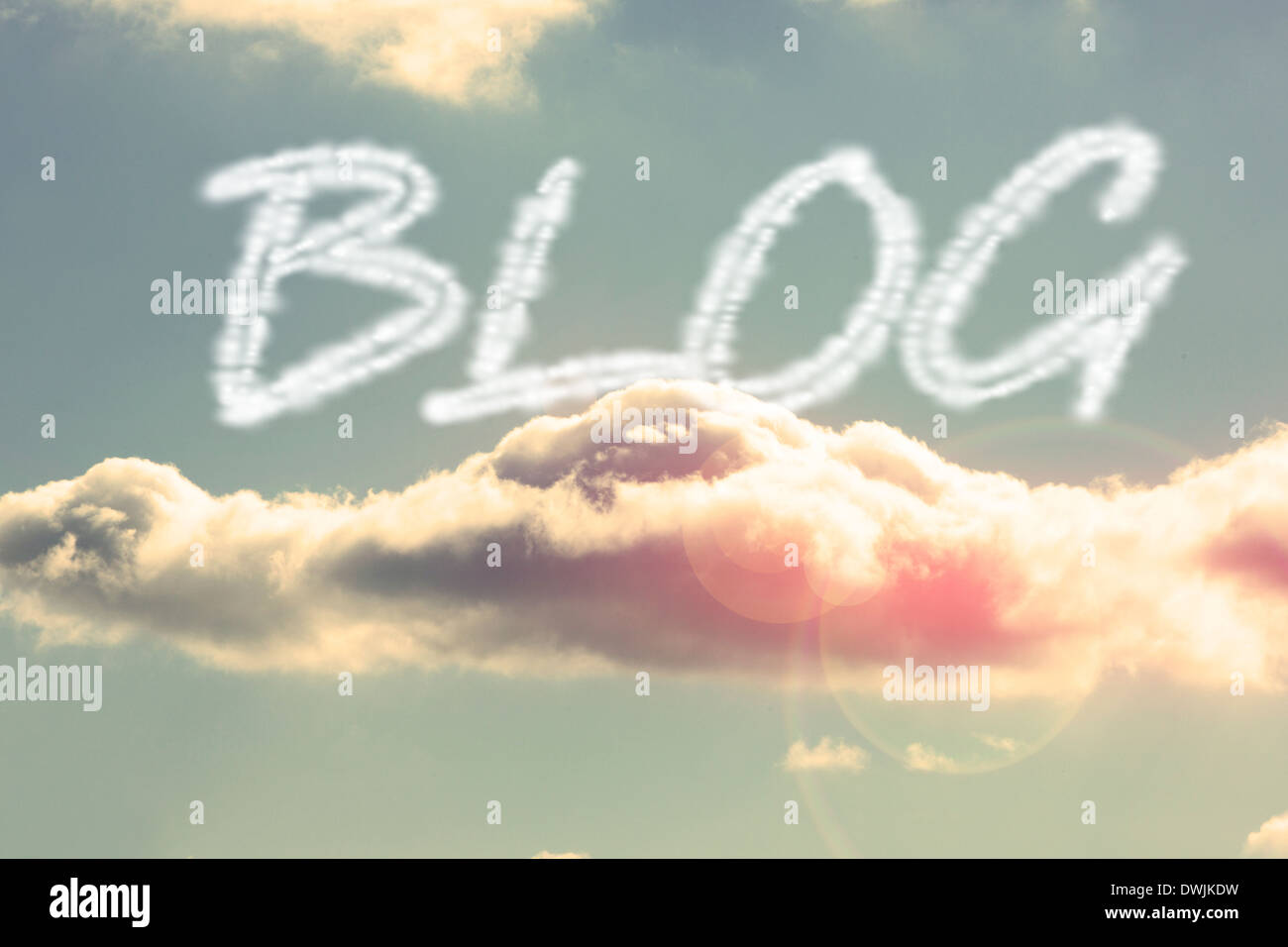 Blog against bright blue sky with cloud Stock Photo - Alamy