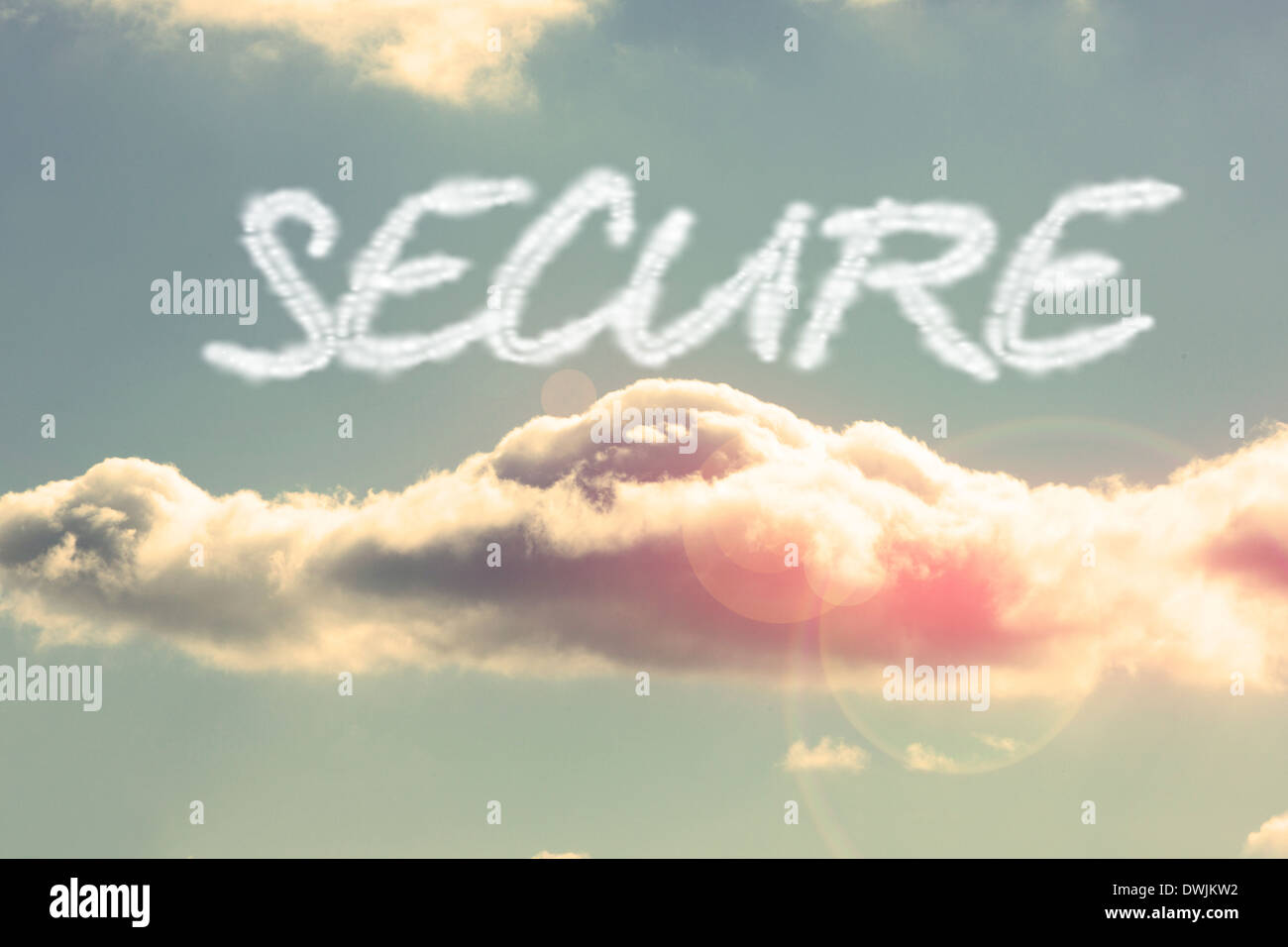 Secure against bright blue sky with cloud Stock Photo - Alamy