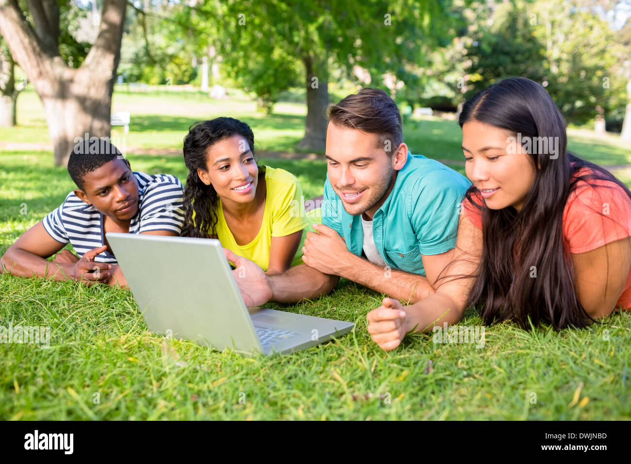 Students using laptop on campus Stock Photo