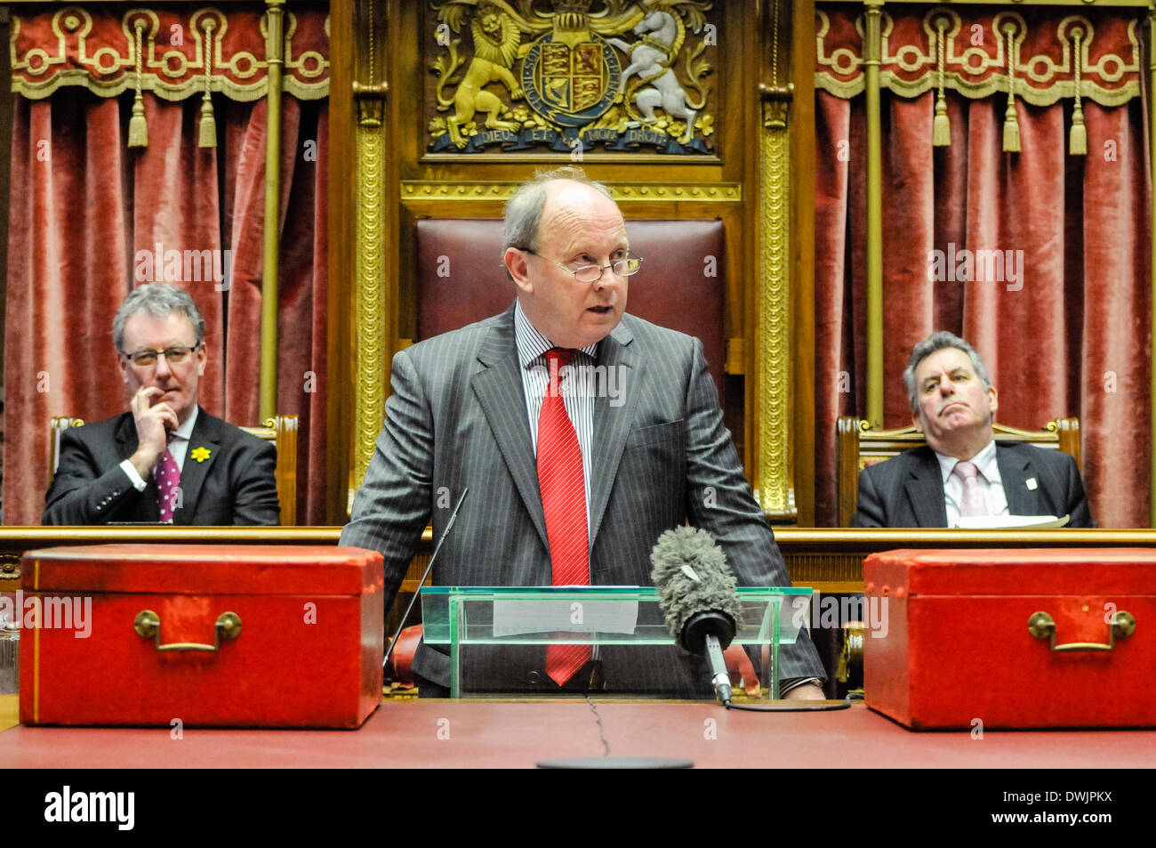 Belfast, Northern Ireland. 10 Mar 2014 - Jim Allister (TUV) speaking in the Senate Chamber, Parliament Buildings, Mike Nesbitt (UUP Leader) and Alban Maguinness (SDLP) behind, Stormont. Credit:  Stephen Barnes/Alamy Live News Stock Photo