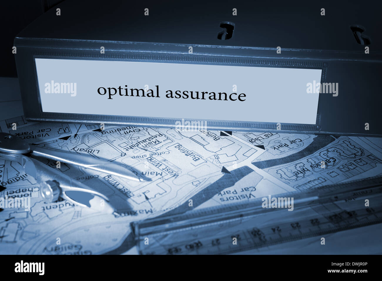 Optimal assurance on blue business binder Stock Photo
