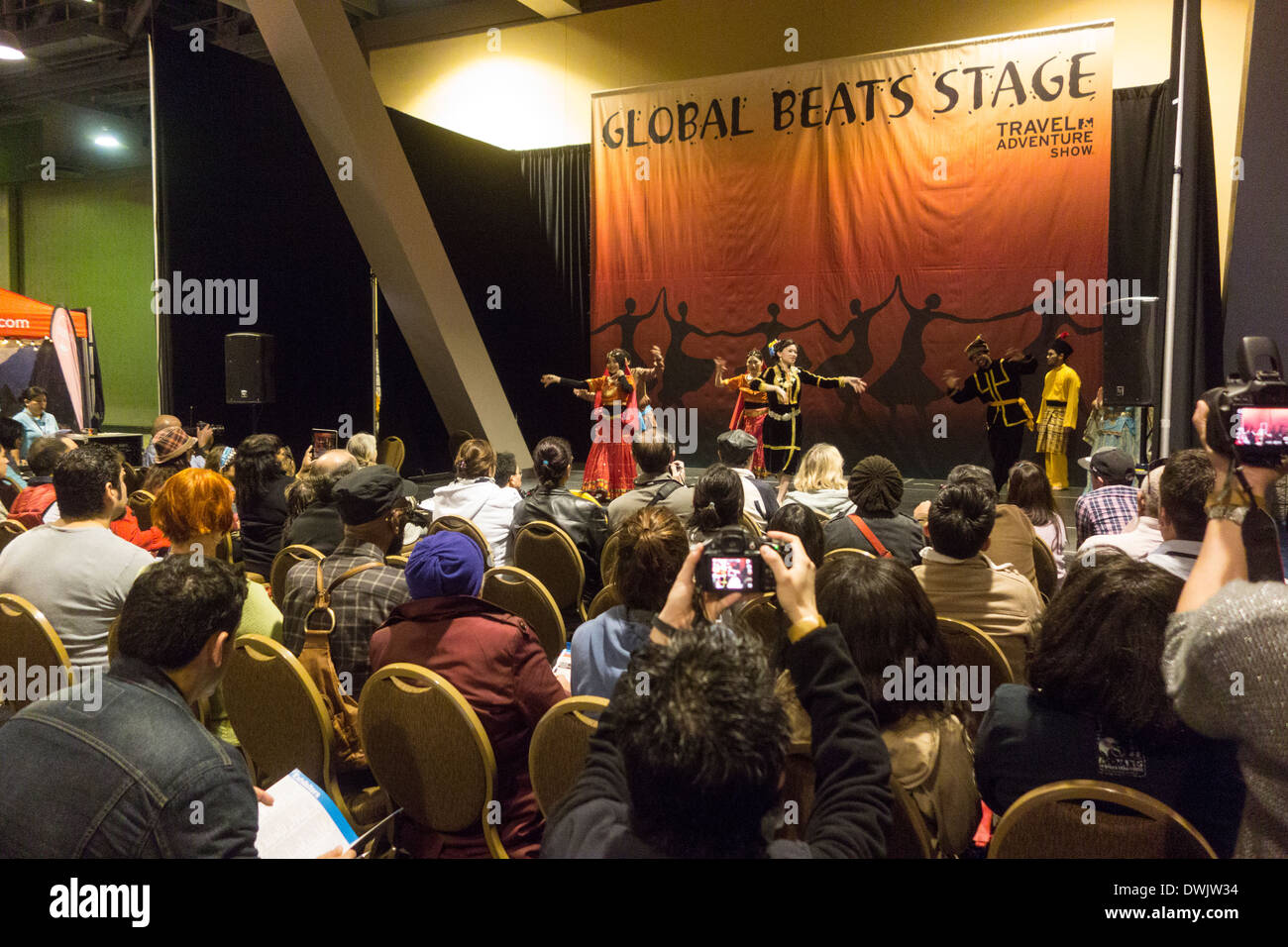 dance performance by Asian dancers in traditional dress at Travel Trade Show in Los Angeles California United States Stock Photo