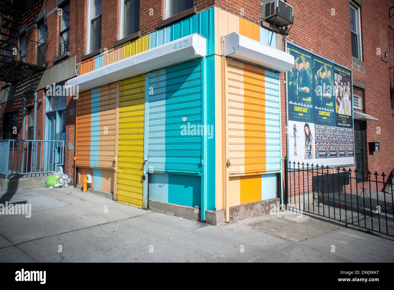 Painted gates on closed storefront along Smith Street in the Carroll Gardens neighborhood of Brooklyn in New York Stock Photo