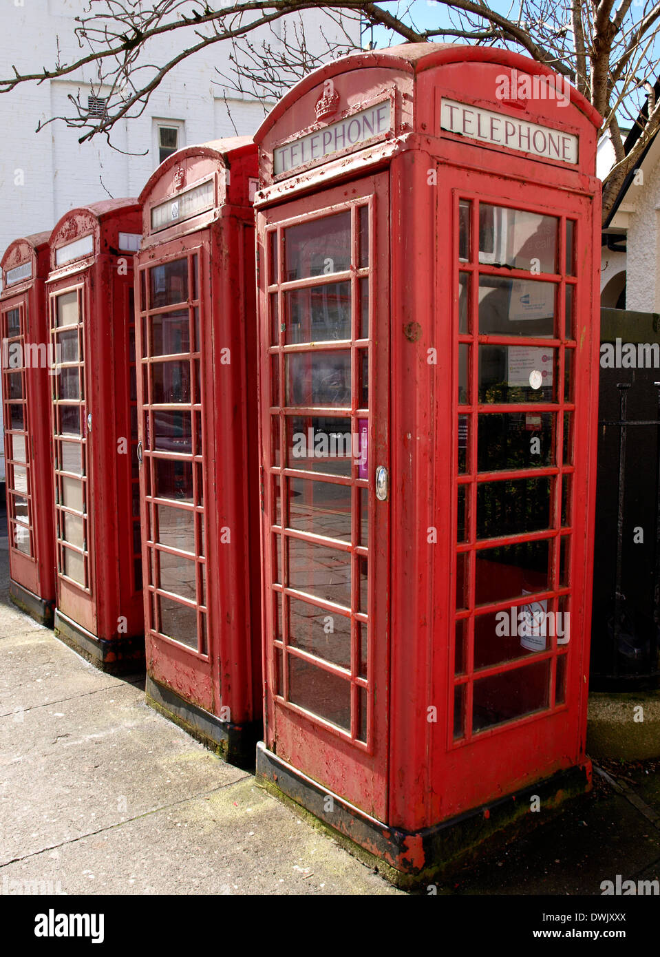 Row of old red telephone boxes, Truro, Cornwall, UK Stock Photo