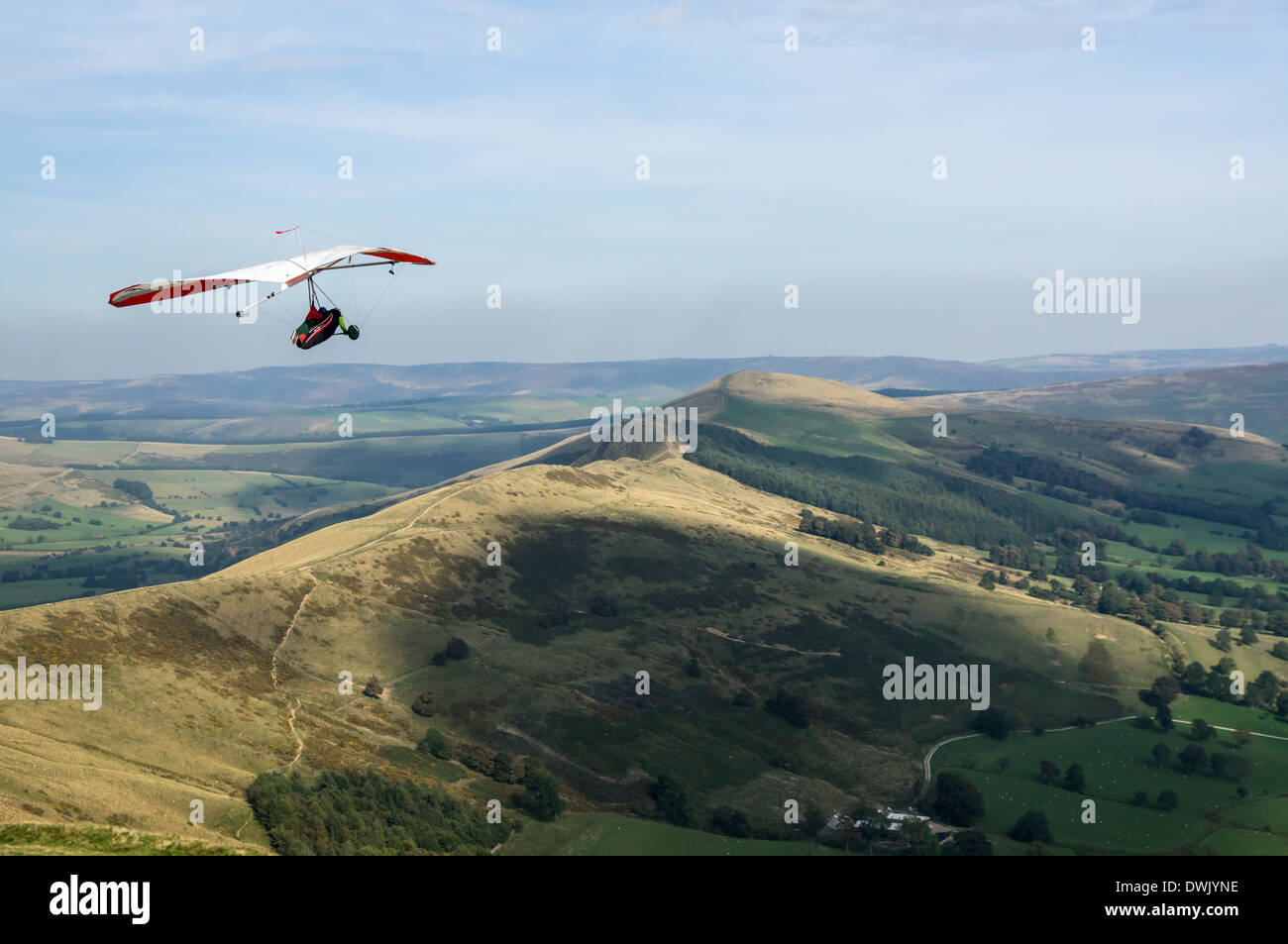 Two men hang gliding over the Hope Valley in Peak District National Park Derbyshire England United Kingdom UK Stock Photo