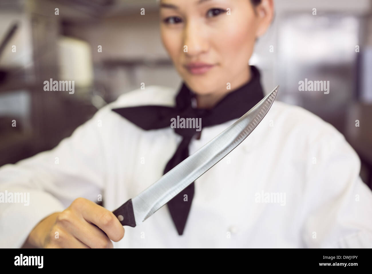 Asian female cook knife hi-res stock photography and images - Alamy