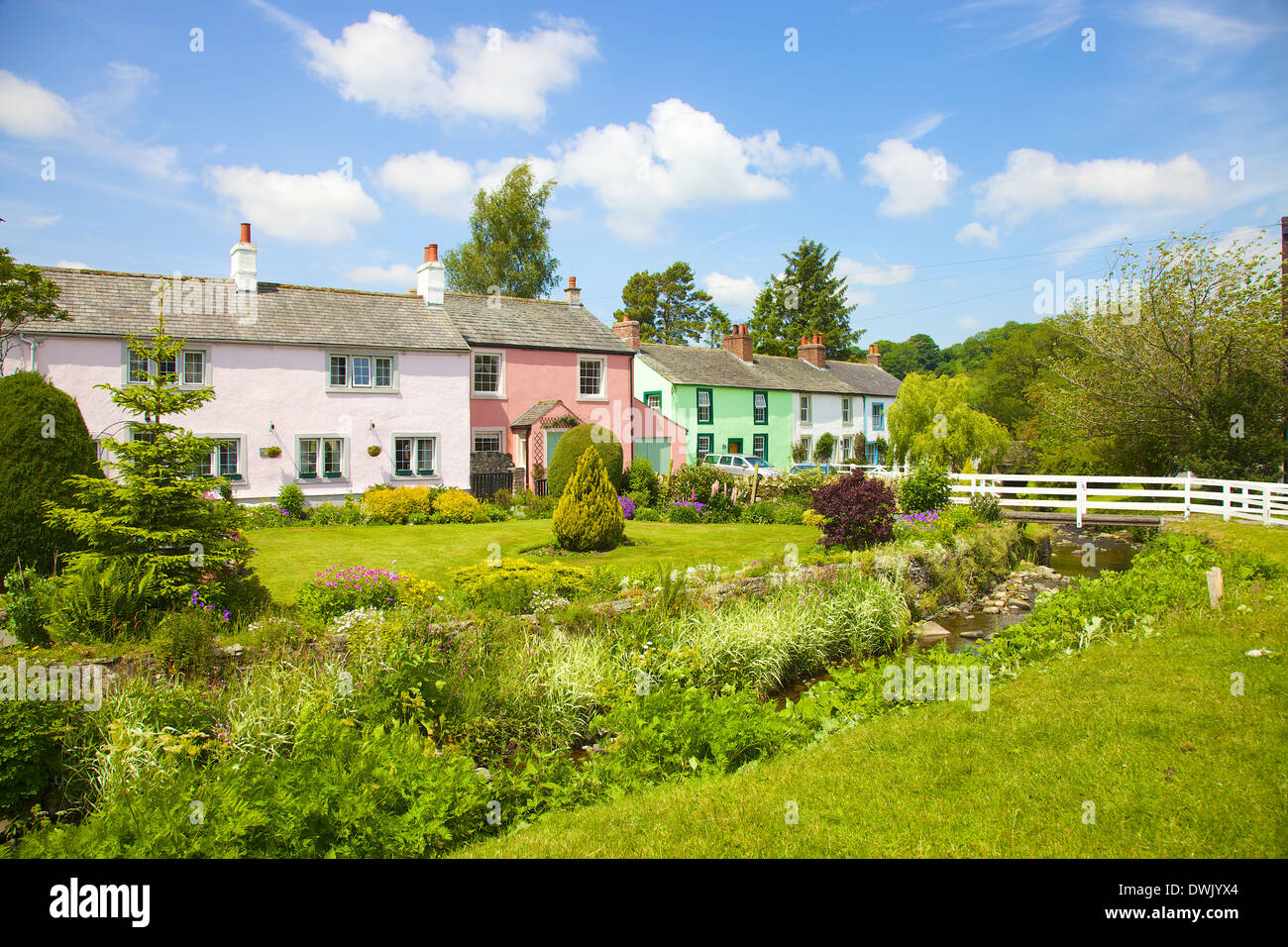 Brightly coloured painted houses at Caldbeck, Lake District, Cumbria